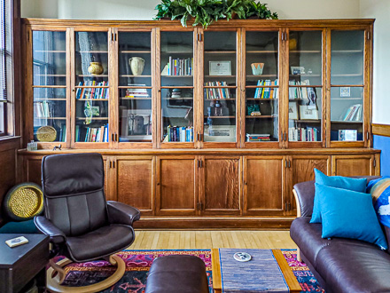 Kathleen Gleeson Counseling Iowa City Therapist psychotherapy loss trauma PTSD EMDR office bookcase